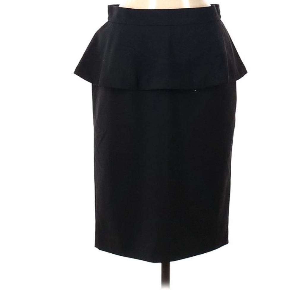 Only worn a few x’s! Vince Camuto Black Peplum skirt. Size 4